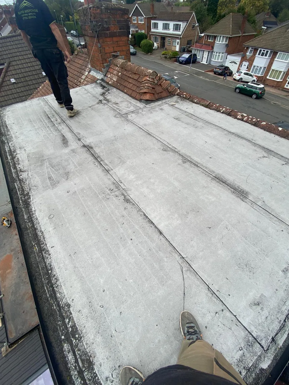 Flat roof before work began, photographed in portrait