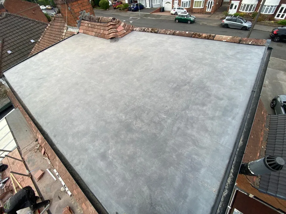 Finished flat roof from the featured project, photographed in landscape