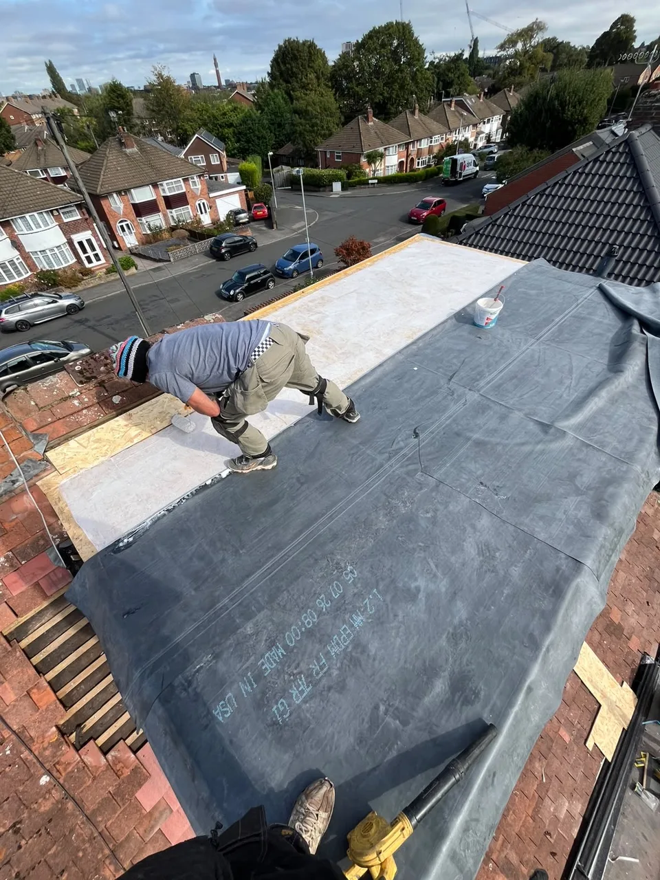 Roofing membrane being laid on the featured project with roof edges unfinished